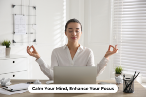 Person taking a pause from working on computer to meditate.