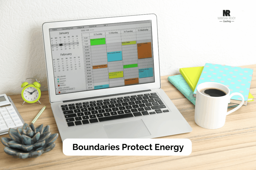 Open laptop displaying a color-coded digital calendar with meetings and tasks, next to a coffee cup, notebooks, and a small clock. Text overlay reads: ‘Boundaries Protect Energy.’