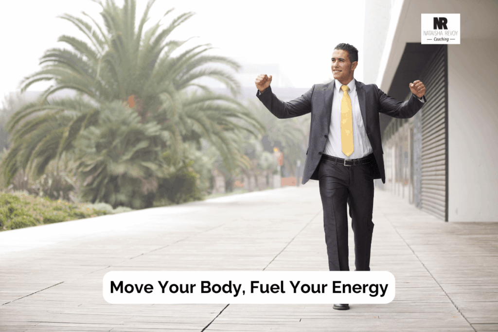 Smiling businessman in a suit with yellow tie walking outdoors with arms raised in a confident stride. Text overlay reads: ‘Move Your Body, Fuel Your Energy.’