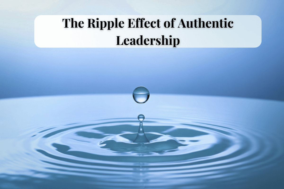 A drop of water creating ripples in a calm blue surface, symbolizing the ripple effect of authentic leadership.