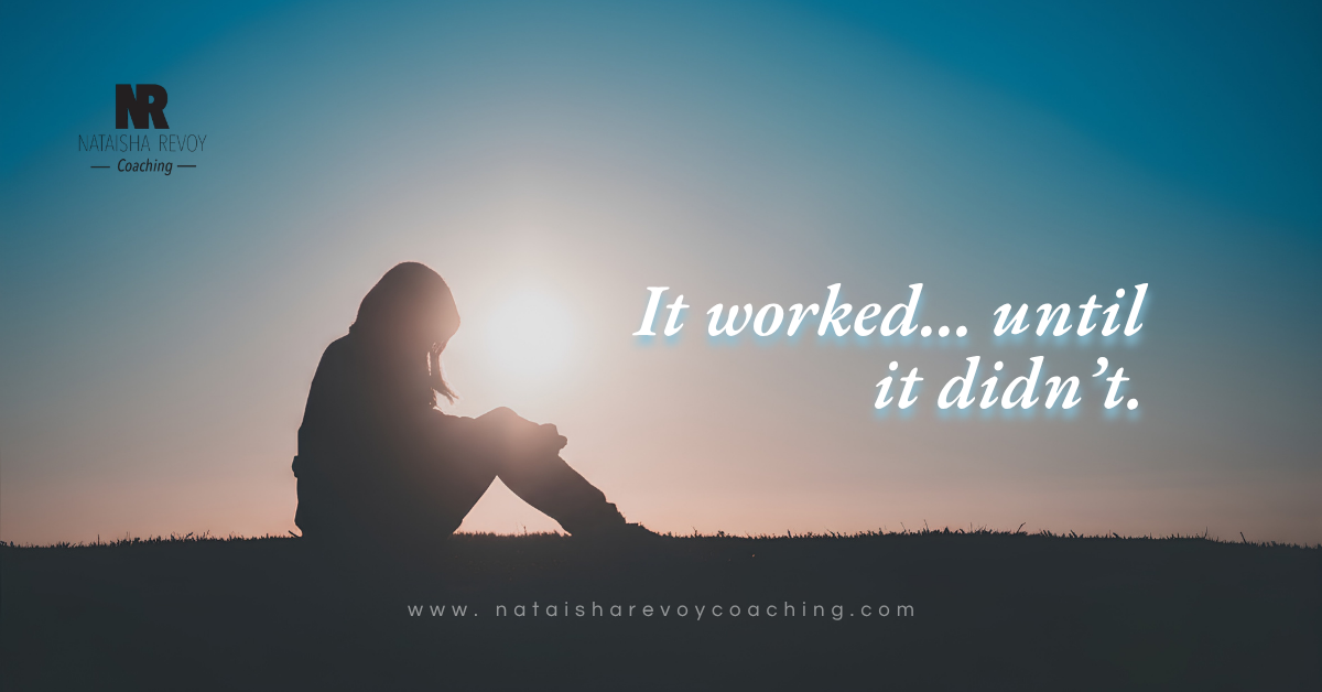 A person sitting in a calm space, reflecting thoughtfully, representing a moment of realization.